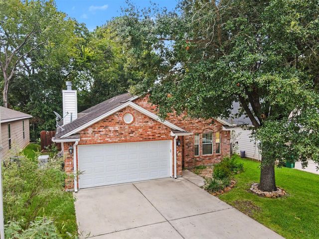 4922 Pleasure Lake Lane, Willis, TX 77318