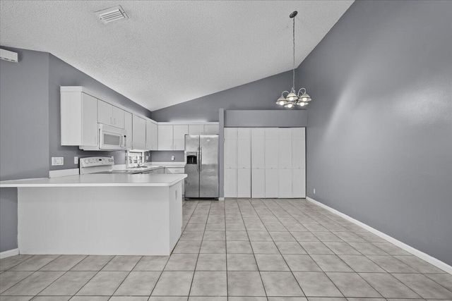 12556 Woodmill Drive, Palm Beach Gardens, FL 33418