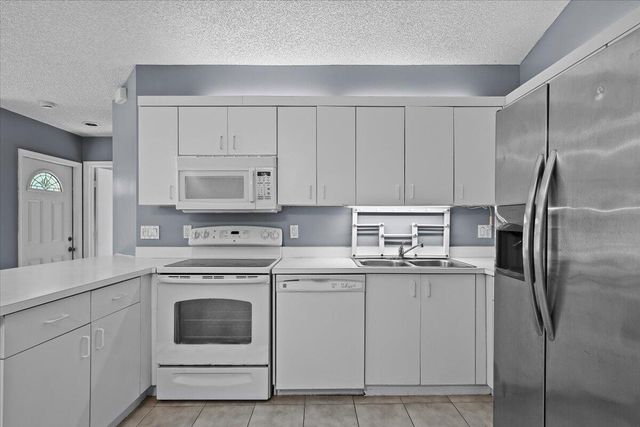 12556 Woodmill Drive, Palm Beach Gardens, FL 33418