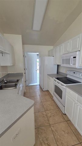 411 NE JUANITA PL 411, Cape Coral, FL 33909