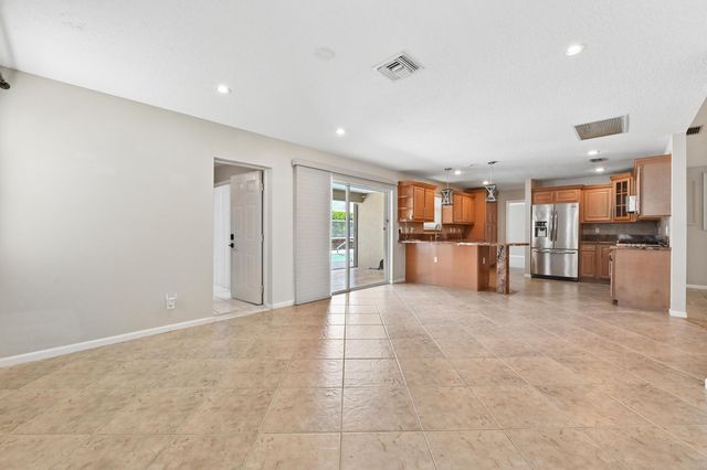 1163 Peninsula Way, Greenacres, FL 33413
