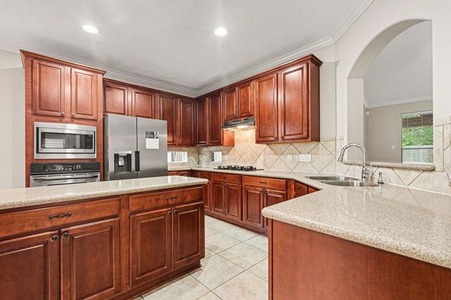 6511 Greencreek Meadows Lane, Spring, TX 77379