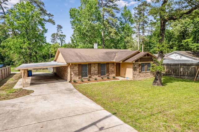 12118 Quail Hollow Lane, Pinehurst, TX 77362