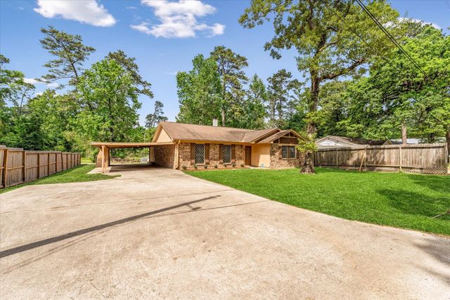12118 Quail Hollow Lane, Pinehurst, TX 77362