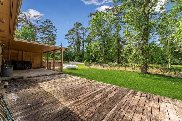 12118 Quail Hollow Lane, Pinehurst, TX 77362