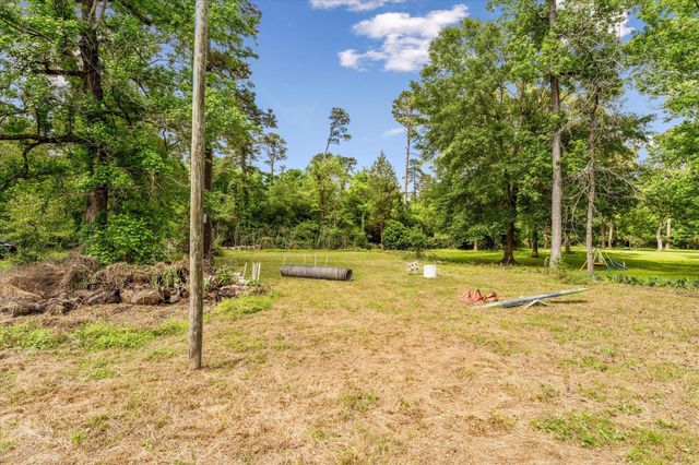 12118 Quail Hollow Lane, Pinehurst, TX 77362