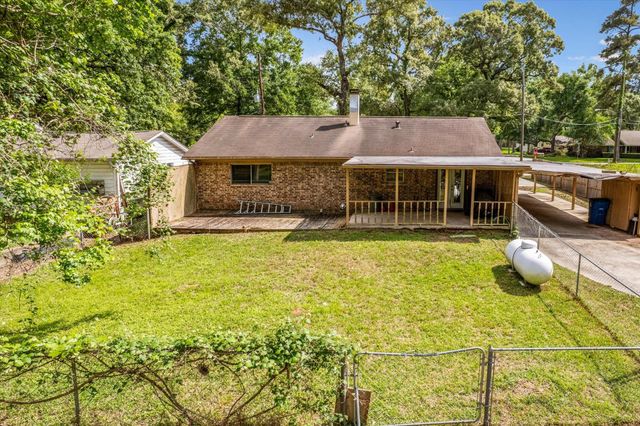 12118 Quail Hollow Lane, Pinehurst, TX 77362