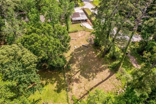 12118 Quail Hollow Lane, Pinehurst, TX 77362