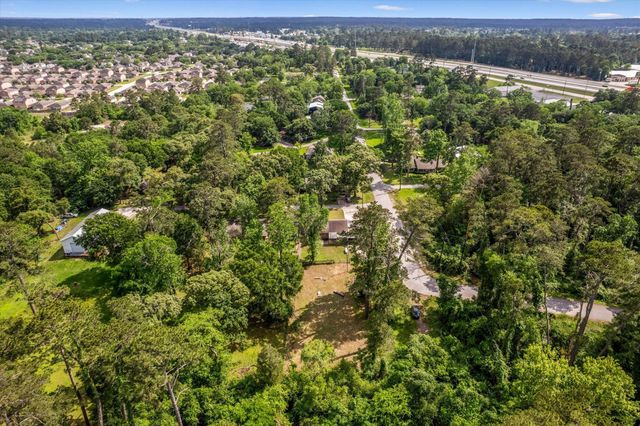 12118 Quail Hollow Lane, Pinehurst, TX 77362