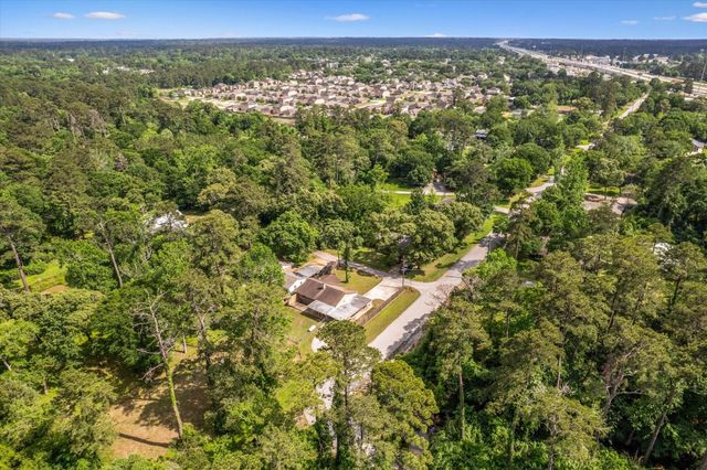 12118 Quail Hollow Lane, Pinehurst, TX 77362