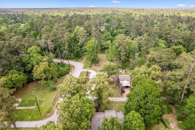 12118 Quail Hollow Lane, Pinehurst, TX 77362