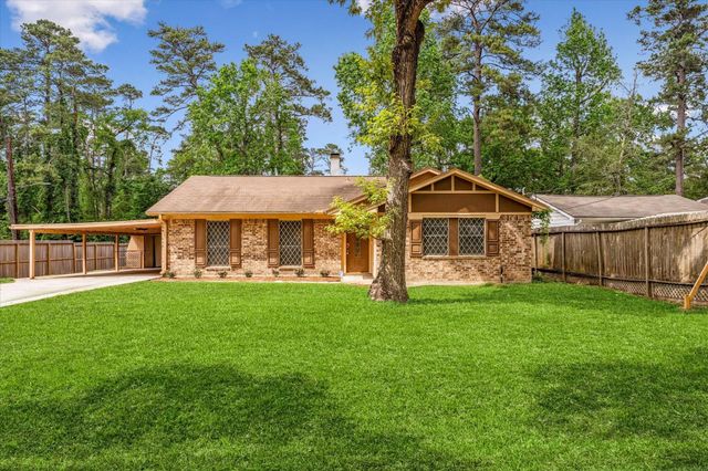 12118 Quail Hollow Lane, Pinehurst, TX 77362