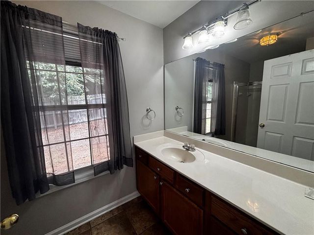 104 ROSE COTTAGE Lane, Woodstock, GA 30189