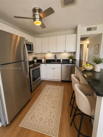 13450 SW 3rd Street 404D, Pembroke Pines, FL 33027
