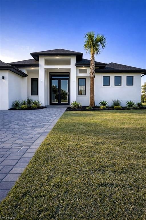 1316 NE 33rd ST, CAPE CORAL, FL 33909 — photo 2
