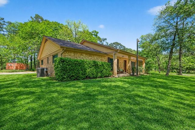 802 Sentinel Oaks, Pinehurst, TX 77362