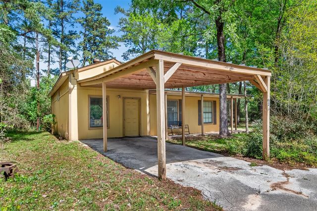 802 Sentinel Oaks, Pinehurst, TX 77362