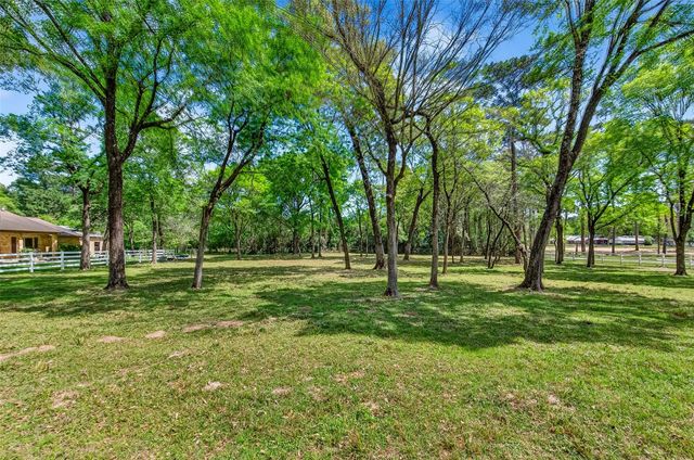 802 Sentinel Oaks, Pinehurst, TX 77362
