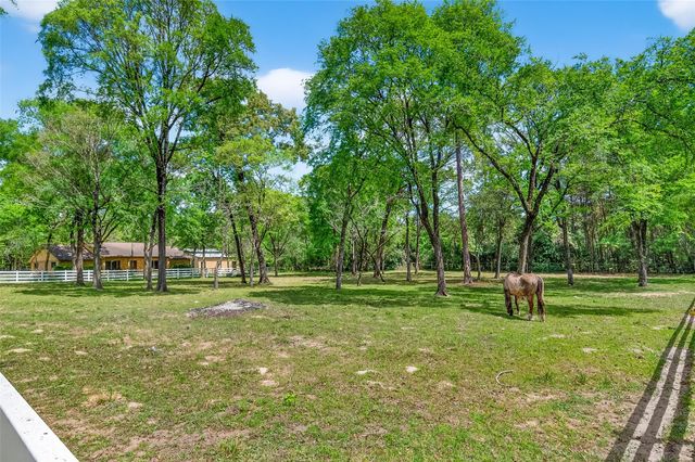 802 Sentinel Oaks, Pinehurst, TX 77362