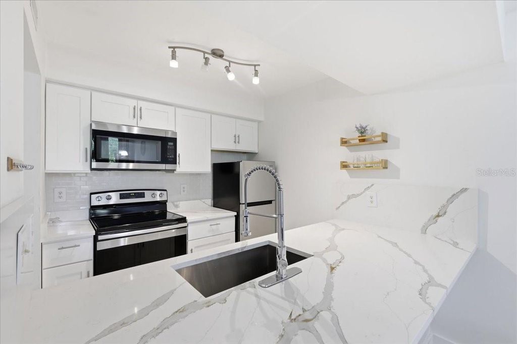 Image 4 of property listing at 6074 PEREGRINE AVENUE B02, Orlando, FL 32819