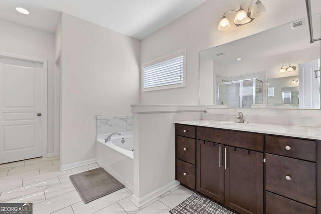 87 Round Pond Drive, Lilburn, GA 30047