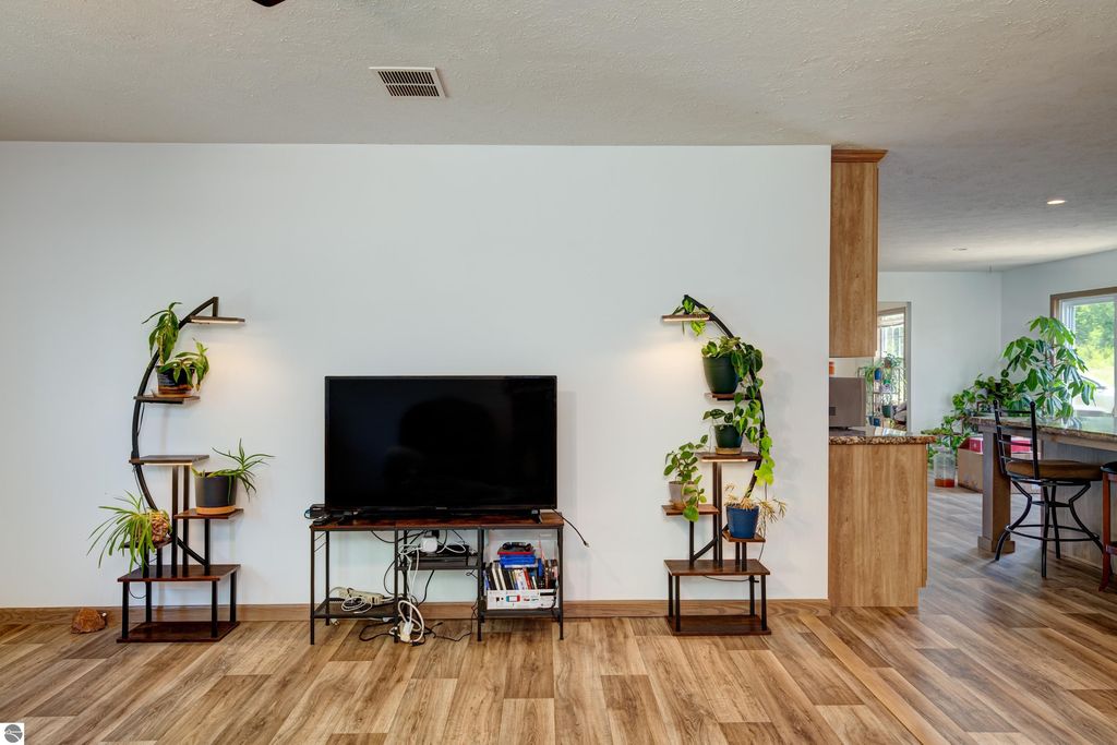 Image 15 of property listing at 303 Westwood Road, Nw, Alden, MI 49612