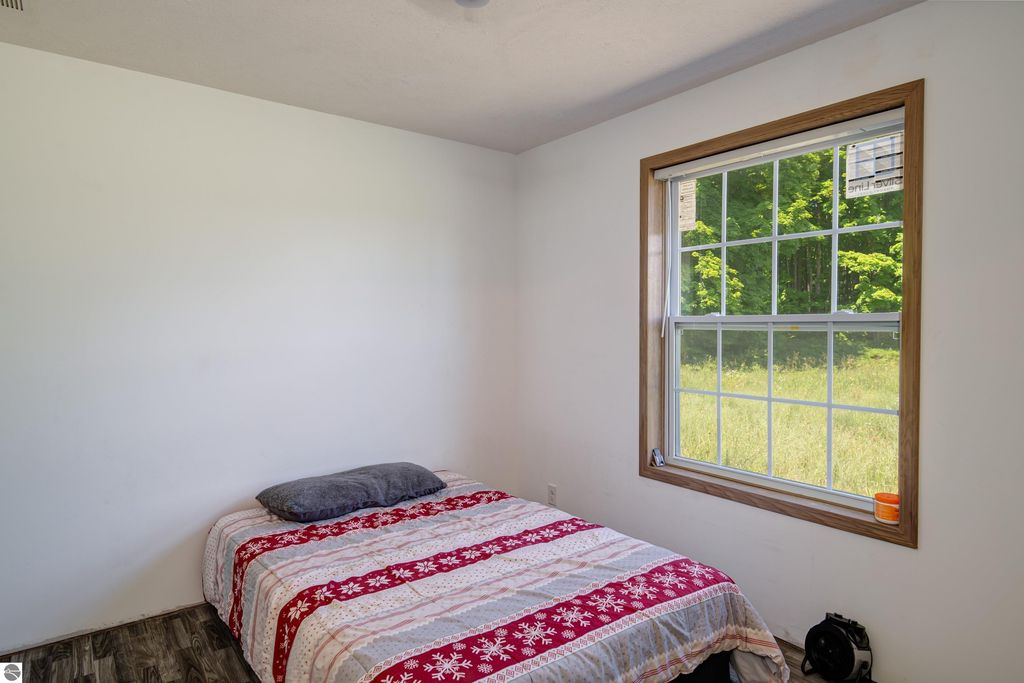 Image 20 of property listing at 303 Westwood Road, Nw, Alden, MI 49612