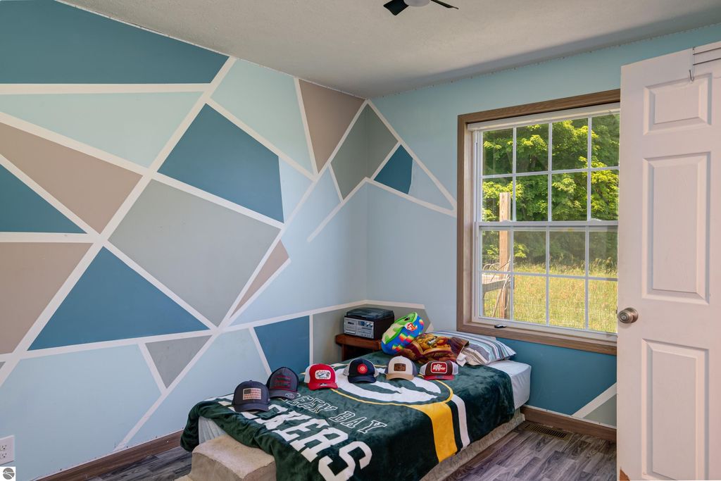 Image 22 of property listing at 303 Westwood Road, Nw, Alden, MI 49612