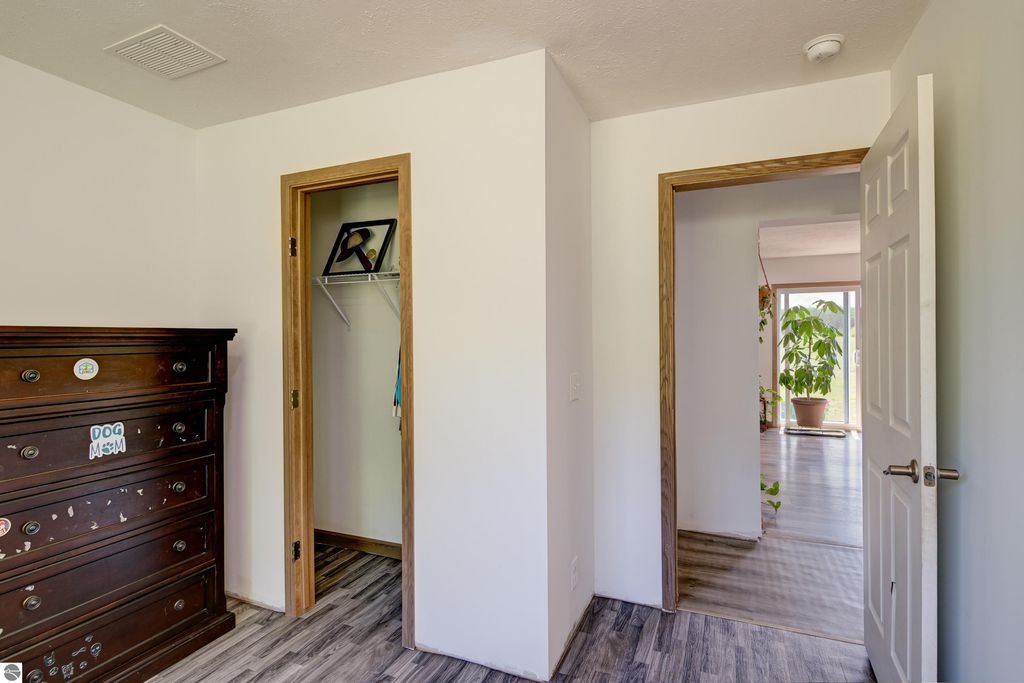 Image 25 of property listing at 303 Westwood Road, Nw, Alden, MI 49612