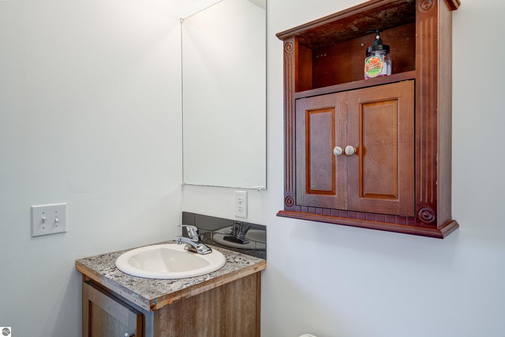 Image 28 of property listing at 303 Westwood Road, Nw, Alden, MI 49612