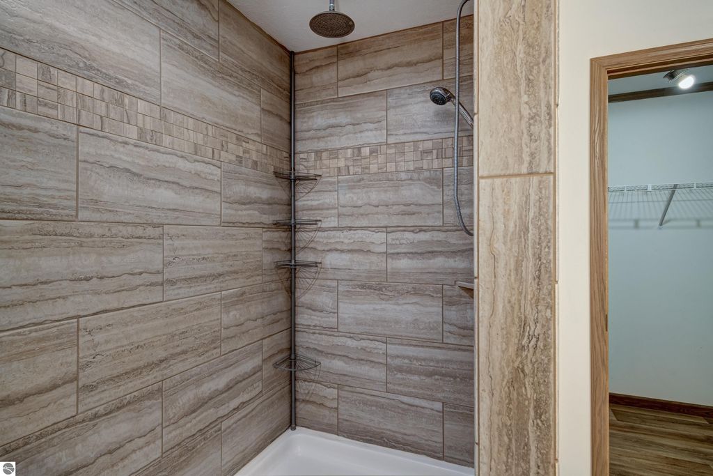 Image 37 of property listing at 303 Westwood Road, Nw, Alden, MI 49612