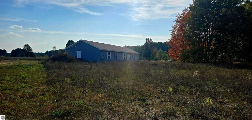 Image 64 of property listing at 303 Westwood Road, Nw, Alden, MI 49612