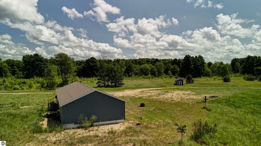 Image 66 of property listing at 303 Westwood Road, Nw, Alden, MI 49612