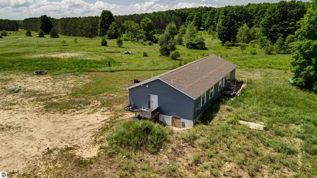 Image 67 of property listing at 303 Westwood Road, Nw, Alden, MI 49612