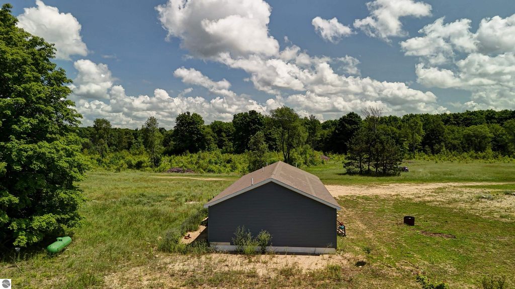 Image 68 of property listing at 303 Westwood Road, Nw, Alden, MI 49612