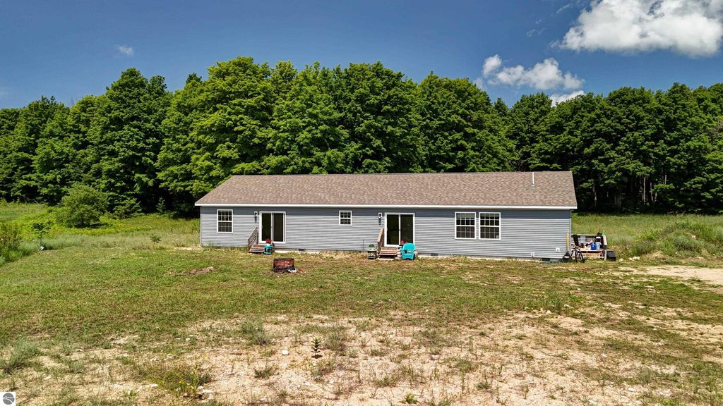 Image 70 of property listing at 303 Westwood Road, Nw, Alden, MI 49612