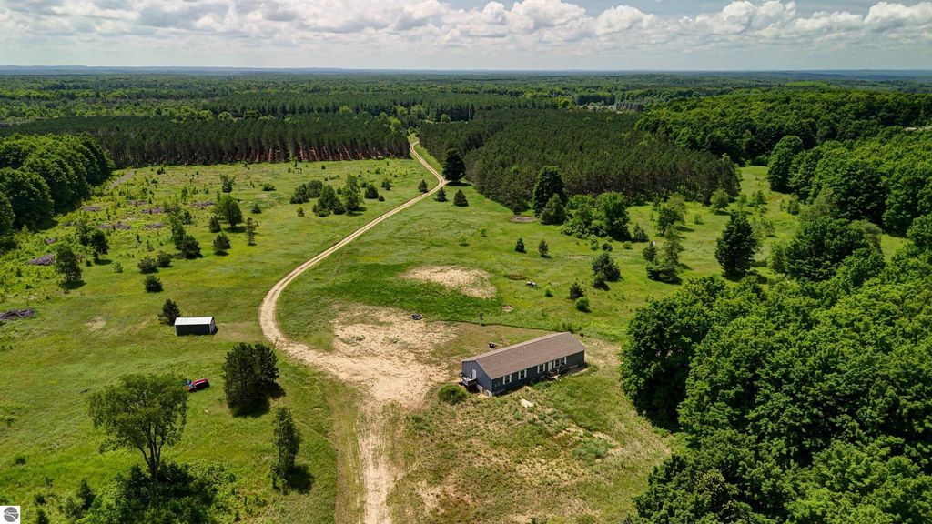 Image 76 of property listing at 303 Westwood Road, Nw, Alden, MI 49612