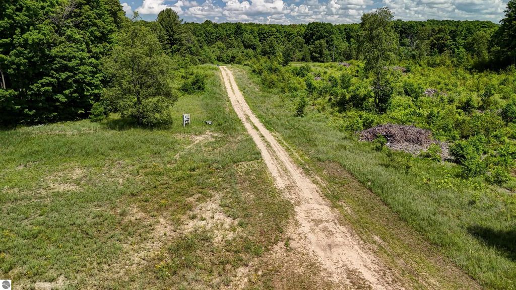 Image 77 of property listing at 303 Westwood Road, Nw, Alden, MI 49612