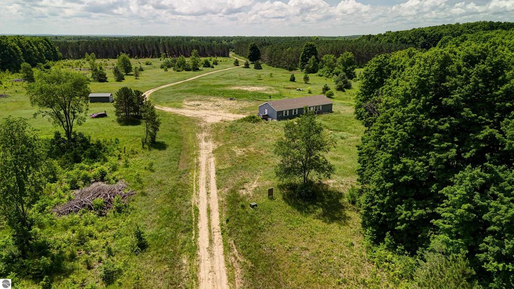 Image 79 of property listing at 303 Westwood Road, Nw, Alden, MI 49612