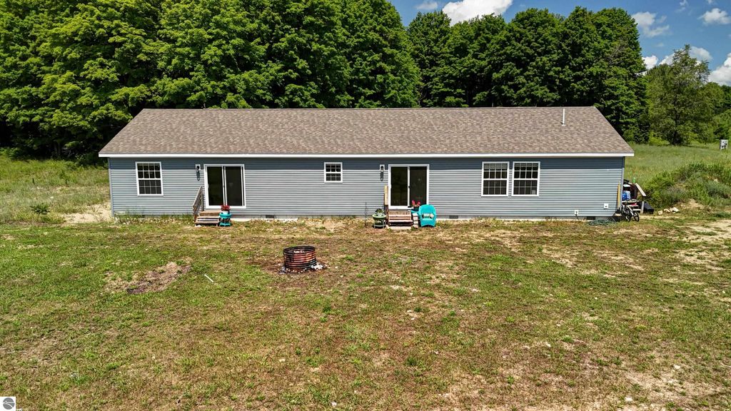 Image 86 of property listing at 303 Westwood Road, Nw, Alden, MI 49612