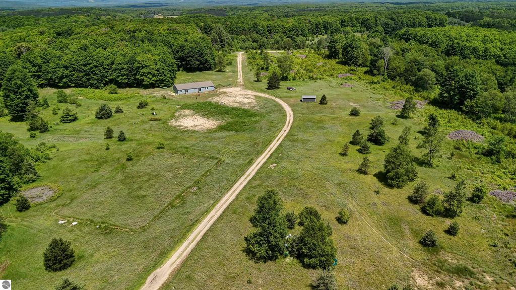 Image 92 of property listing at 303 Westwood Road, Nw, Alden, MI 49612