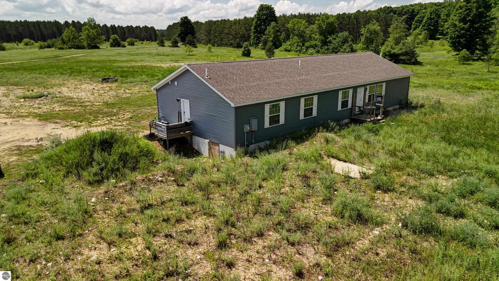 Image 94 of property listing at 303 Westwood Road, Nw, Alden, MI 49612