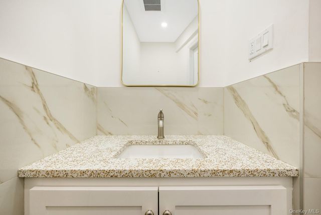 69-05 61st Road, Middle Village, NY 11379