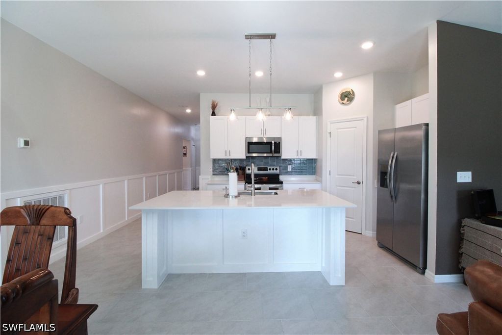 Image 6 of property listing at 2702 NE 5th AVE, Cape Coral, FL 33909
