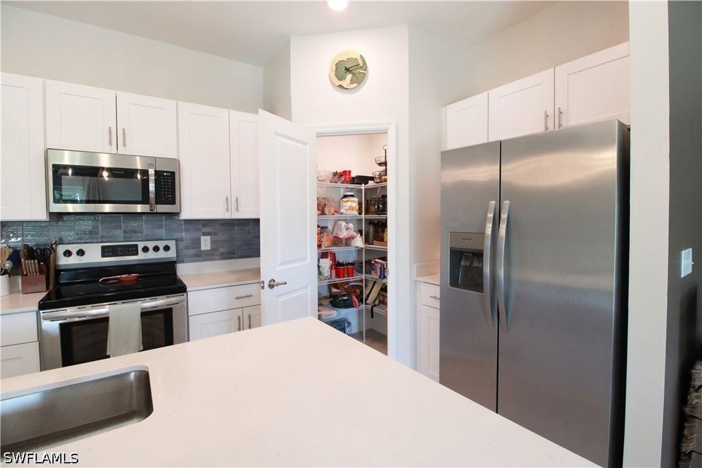 Image 9 of property listing at 2702 NE 5th AVE, Cape Coral, FL 33909