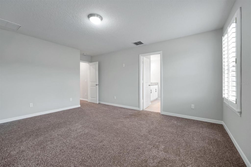 Image 17 of property listing at 9872 AUREA MOSS LANE, Orlando, FL 32832