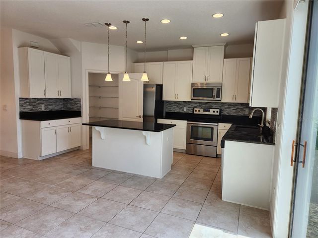 9805 WINNINGTON STREET, Orlando, FL 32832