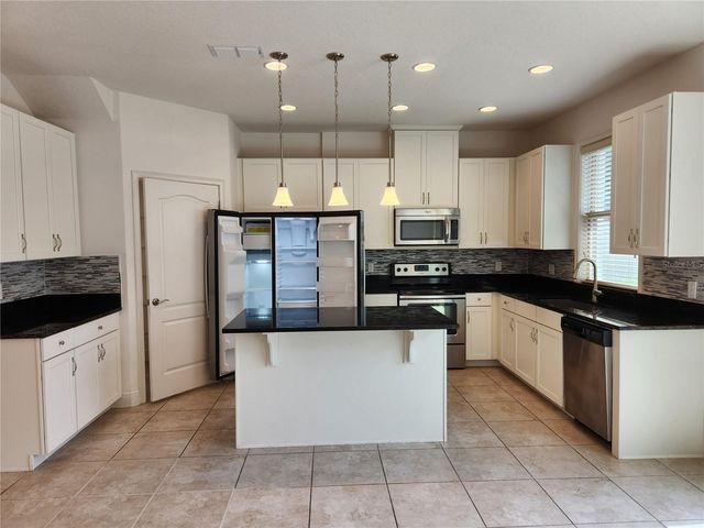 9805 WINNINGTON STREET, Orlando, FL 32832