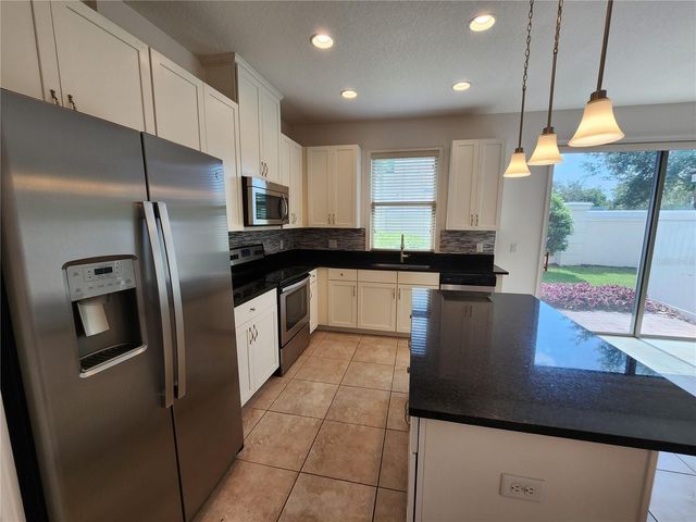 9805 WINNINGTON STREET, Orlando, FL 32832