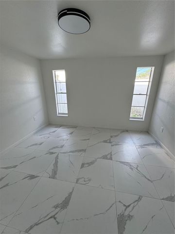 7712 W POWHATAN, Tampa, FL 33615